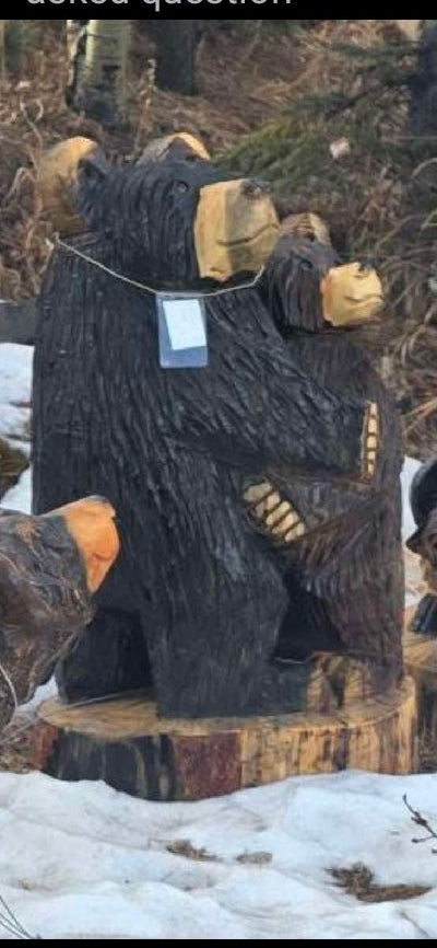 2 bears hugging carving